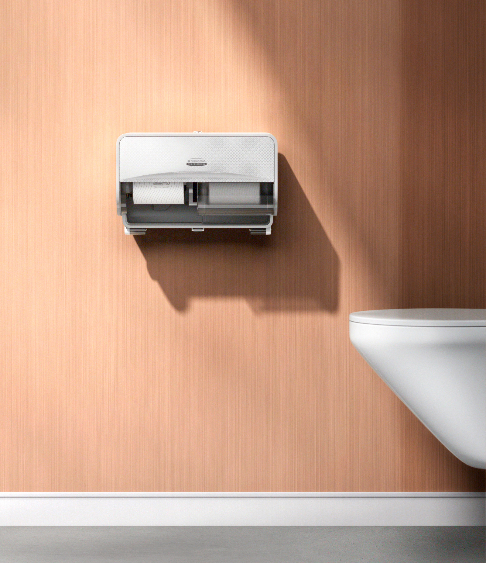 Il dispenser ICON per la carta igienica a rotolino installato sul muro di un bagno